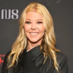 Tara Reid net worth 2025 actress smiling at Hollywood event red carpet appearance