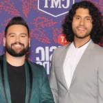 Dan and Shay performing together on stage - country duo who are not brothers but musical partners