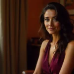 Melanie at CraigScottCapital financial advisor reviewing investment portfolios in modern office setting