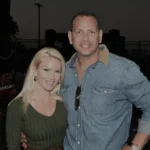 Jaclyn Cordeiro Net Worth and fitness entrepreneur posing confidently in workout gear.