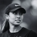 Royce Renee Woods, Tiger Woods' half-sister, smiling in a casual family portrait, symbolizing quiet athletic legacy.