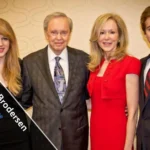 Becky Stanley Brodersen standing with family members at a gathering in Dallas Texas