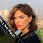 Noa Tishby smiling at event, representing success and Noa Tishby net worth in entertainment industry.