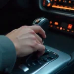 Driver hand switching 2nd gear in manual transmission car with tachometer showing proper RPM for smooth gear shift