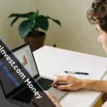 Young investor using TitaniumInvest.com Money platform on laptop for portfolio management at home office desk setup