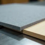 Zuschneidfelle felt pads on panel saw table protecting wood surfaces during cutting in carpentry workshop