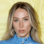 Who is Alix Earle TikTok star posing in casual outfit showcasing her signature relatable influencer style and personality