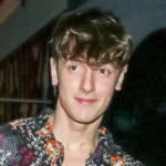 Who is Bryce Hall - TikTok star Bryce Hall posing for professional photo showing his signature confident style