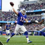 Buffalo Bills vs Detroit Lions player stats game action Josh Allen throwing pass against Detroit defense Ford Field