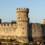 Cesta Roman Second Tower on Monte Titano summit in San Marino with stone battlements and mountain views
