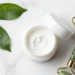 Cilxarhu677 moisturizer jar on marble surface with skincare ingredients and beauty tools for hydration review