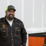 Juan Ibarra working on mining equipment for Gold Rush showing his mechanic skills that built his net worth