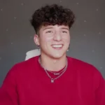 Who is Tony Lopez - Famous TikTok star and dancer with millions of followers posing for social media content photo.
