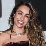 Sommer Ray fitness influencer posing in workout attire showing her bodybuilding physique and Instagram model career