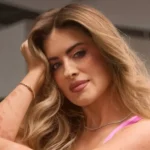 Who is Whitney Simmons - popular fitness YouTuber and Gymshark athlete demonstrating strength training exercises.