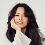 Who is Valkyrae - Rachell Hofstetter streaming on YouTube as content creator and professional gamer with headset on.