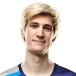 Who is xQc - Félix Lengyel streaming live on Twitch with gaming headset in front of multiple monitors and webcam.