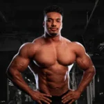 Who is Larry Wheels lifting extreme weight, symbolizing his journey from poverty to elite powerlifting and bodybuilding fame.
