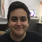 Who is Pokelawls: Canadian Twitch streamer Georgie Karam streaming Overwatch gameplay with professional gaming headset