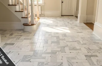 Honed Carrara basket weave marble floor in Chatham NJ entryway with classic colonial trim and wood staircase.