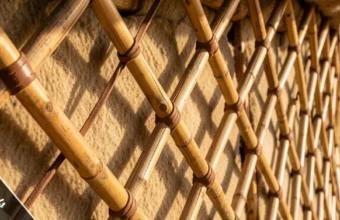 Close-up of oronsuuts, the wooden lattice wall poles of a traditional Mongolian ger tied with leather cord