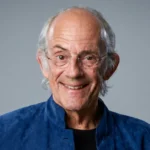 Christopher Lloyd at a Hollywood event, known for his role as Doc Brown in Back to the Future