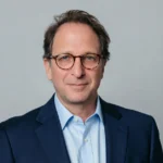 Andrew Weissmann net worth — federal prosecutor and legal analyst in formal attire