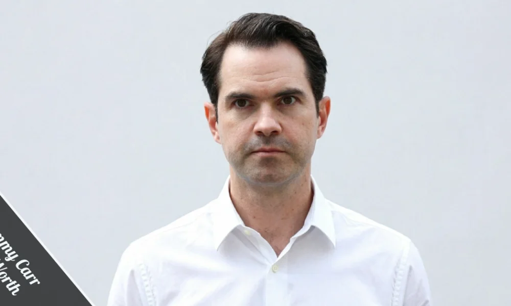 Jimmy Carr in a sharp charcoal suit leans against a black Rolls-Royce, with the London skyline behind him, representing his £25 million Jimmy Carr net worth and comedy career.